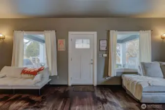 Beautiful Solid Front door with beautiful window detail as a recent upgrade!