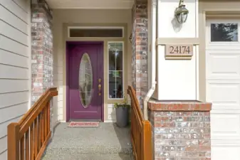 Formal Entry with 2-car garage to the right.