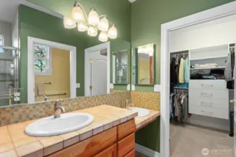 Primary Bedroom Bath and Walk-in Closet.