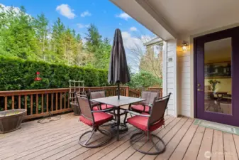 Large Deck with access from the Kitchen nook and the primary bedroom.