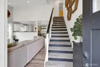 Step inside to soaring ceilings and sleek, modern updates throughout.