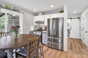 Smartly designed walk-in pantry tucked conveniently under the stairwell.