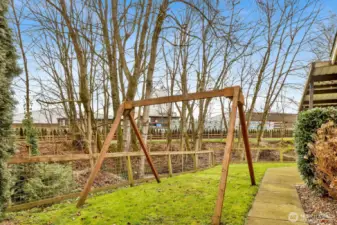 Watch this backyard come alive—lush leaves and greenery make it a true private retreat once spring arrives and it won’t be much longer!
