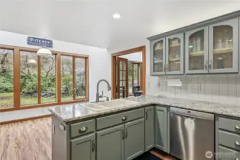 Kitchen sink looks over the eat-in area