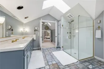 Primary en suite. Double sinks, large shower, and soaking tub