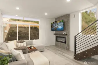 Spacious family room overlooking fenced backyard.