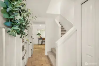 Clean and bright entrance with coat closet and shoe racks - this home is filled with storage opportunites unlike most new construction townhouses.