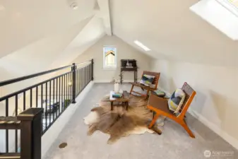 Loft flex space - used by prior owners as a home office. Views of the Cascades from loft and primary bedroom windows on clear days.