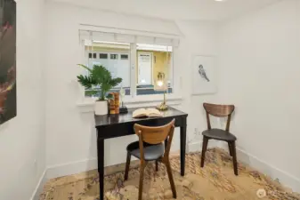 Third bedroom on lower floor with big window and deep closet.