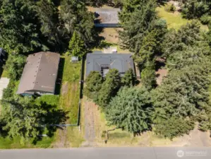 Overhead view of the front of the home and driveway.