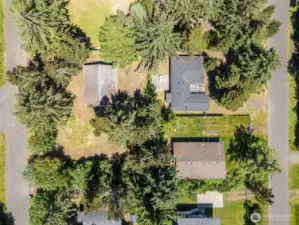 Overhead view of the whole property notice the additional vacant lot also for sale.