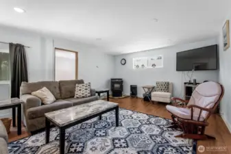 Living room with brand new pellet stove, windows and more!