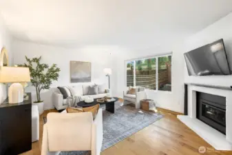 Hard surface flooring and newer gas fireplace makes this a comfy living room.