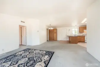 Large living room with access to outdoors
