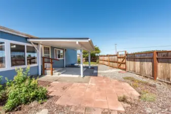 fully fenced and gated backyard