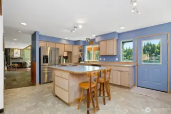 Kitchen with large island and room to entertain.