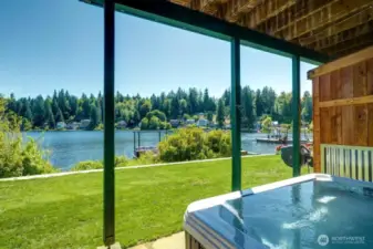 Hot tub, located just steps from the lake and the outdoor shower.