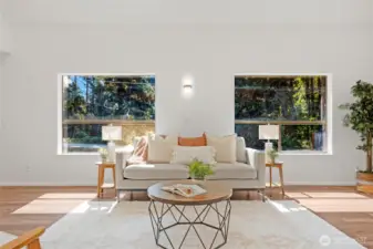 2 large front windows in living room.