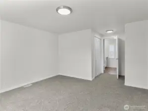 Primary bedroom has dual closets leading to the ensuite bath