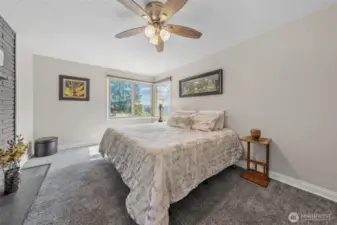 Main level primary w/fireplace.