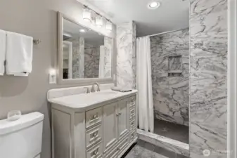 Gorgeous shower w/bench.