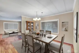 This home offers a blend of casual and formal spaces. This area could be dining room or flex space / family room.   Room for 6-8 place table and additional furniture.