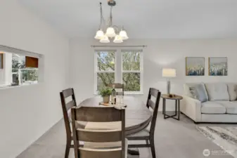 Spacious dining area with kitchen pass-thru