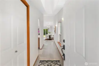 Refreshed home with new floors, vaulted ceilings & natural light!