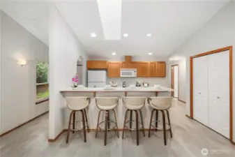 High-top breakfast bar and pantry complete the kitchen!
