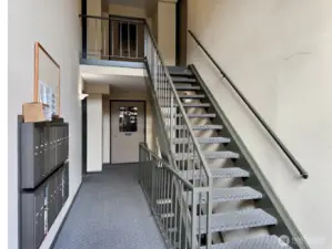 Entrance right behind the stairs