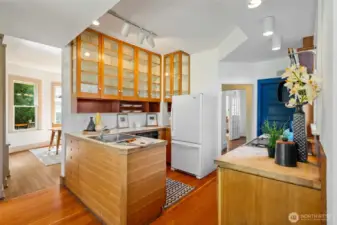 Attractive upper glass-faced kitchen cabinets