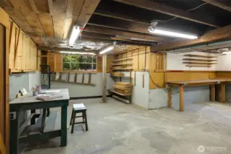 Immense lower level with laundry, workshop, crafts area and plenty of storage, plus a handy 1/4 bath