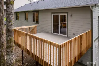 Rear deck with stairs.