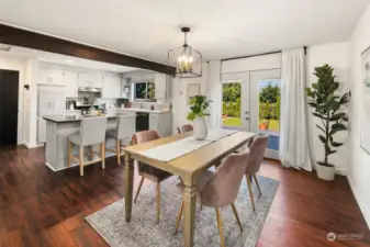 Dining space opens to beautiful back deck