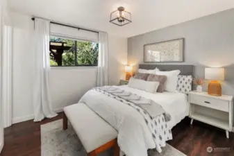 Primary bedroom with lots of natural light