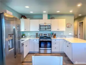 View of kitchen from dining table