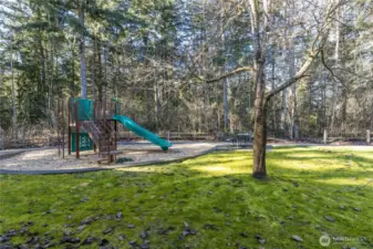 Community playground and picnic area are just steps out your back door!