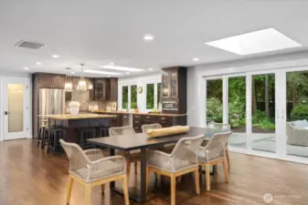 Generously-sized dining room has 14-ft wall-sized sliding doors that open to the outdoors!
