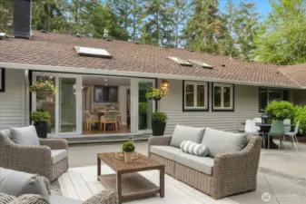 Bring the outdoors in and with these large sliding doors, you can entertain seamlessly across all the living spaces outside and inside.