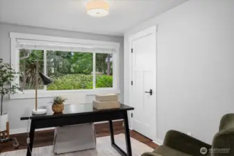 Fifth bedroom or Office/Den with backyard views!