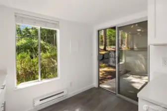 Big window and slider off of kitchen