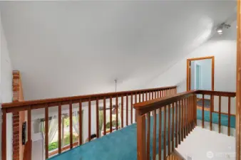 Cat walk connecting the primary bedroom and bedroom 3