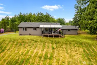 This updated rambler welcomes you with fresh paint, a new roof, and an inviting covered deck — perfect for year-round entertaining or your morning coffee with nature. Quality craftsmanship meets comfort and functionality.