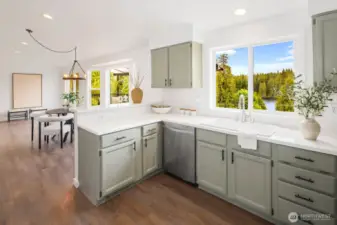 This kitchen keeps you connected to the action while offering a peaceful escape into nature just beyond the glass.