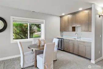 A wet bar and wine cooler make entertaining a breeze
