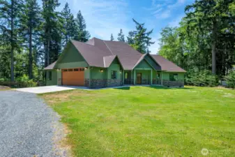 Custom built retreat on 5 parked out acres with lake frontage