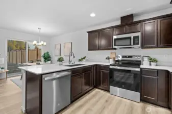 Photographs are for illustrative purposes only. Features, finishes, interior/exterior colors, landscaping and floorplan shown may vary from actual homes built.