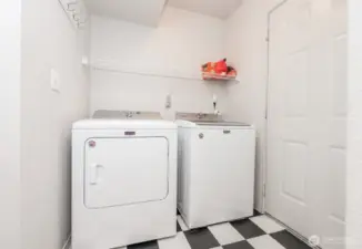 main floor Laundry room connects to garage door