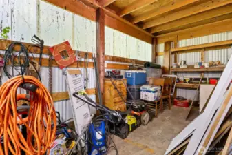 Appreciate an additional workshop built onto the back of the detached garage.