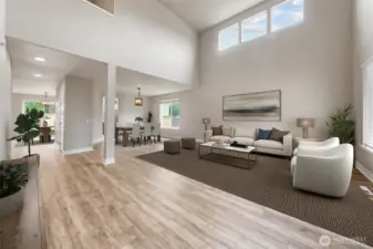 Dramatic two story living room lets in lots of light!